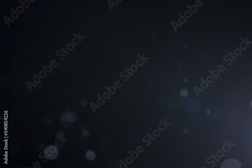 A dark blue background bokeh image for used to decorate background.