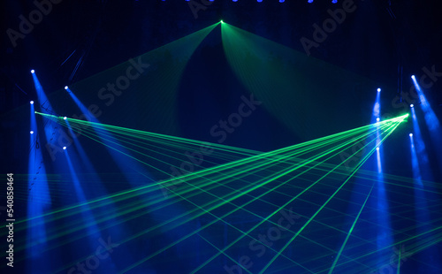 Colorful stage spotlights with laser radiation
