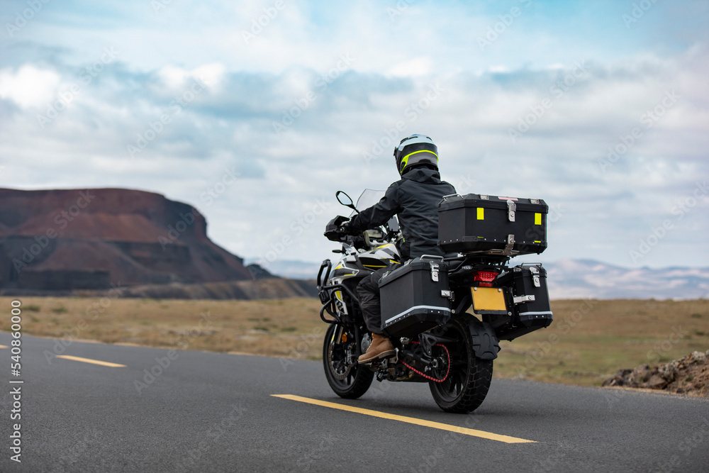 Mid adult man riding motorcycle Mid adult man riding motorcycle