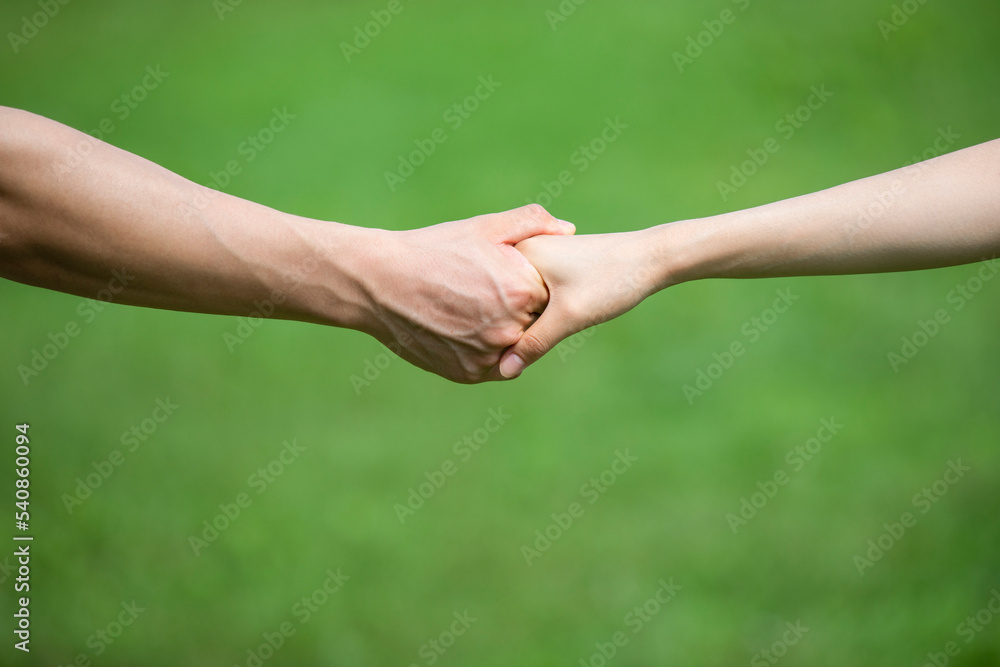 Happy young couple holding hands Happy young couple holding hands