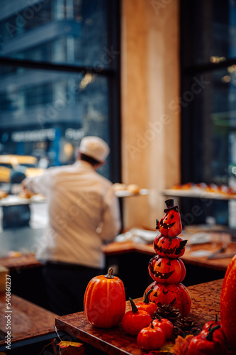 Pumpkin decorations in a bakery store 