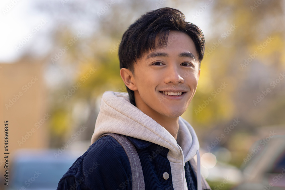 Portrait of cheerful college student Portrait of cheerful college student