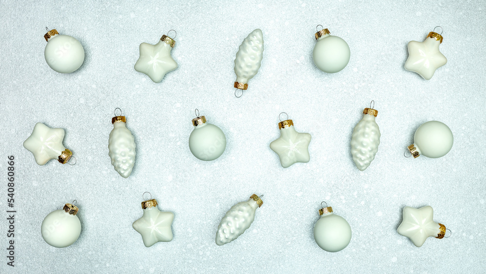 various christmas tree decorations and baubles on silver background. above, top view. various christmas tree decorations and baubles on silver background. above, top view.