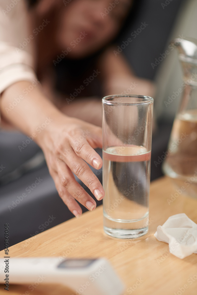 Woman Sick with Influenza Drinking Water
