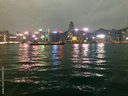 Hong Kong, China, November 2016 - A body of water with a city in the background