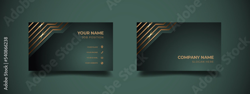 Luxury business card with gold line dark green color background