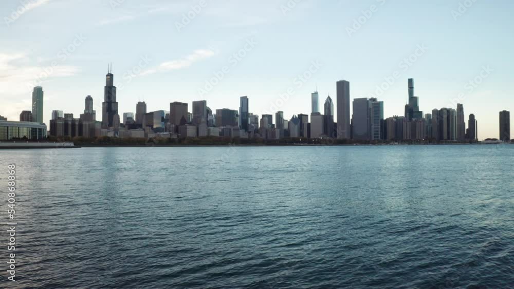 Lake Michigan with Chicago, Illinois skyline in background with stable drone video. Lake Michigan with Chicago, Illinois skyline in background with stable drone video.