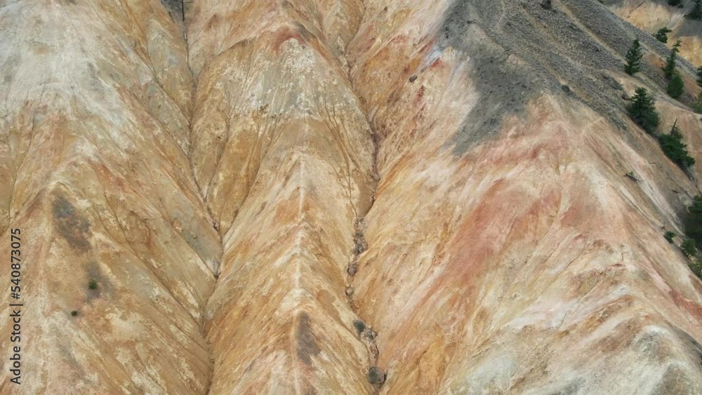 revealing shot of the formed mounds and ridges due to erosion over the ...
