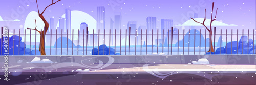 Winter city street with metal fence, bare trees and snowflakes flying in air. Cartoon vector illustration of urban buildings skyline and frosty snowy weather. Empty public garden landscape, dull sky