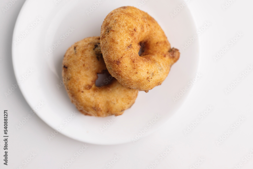 plate of methu vadai, south Indian famous morning snack. plate of methu vadai, south Indian famous morning snack.