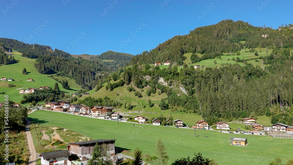 Alpen landscape with green meadows and mountains Alpen landscape with green meadows and mountains