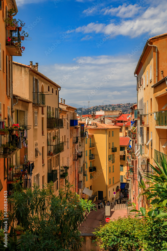 Mediterranean houses in terracotta colors with traditional shutters, Nice France