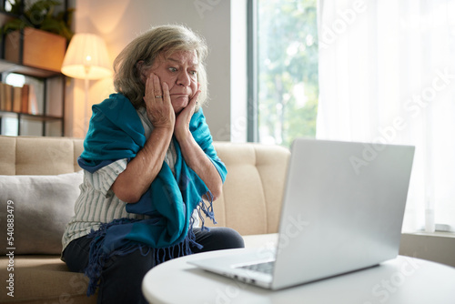 Senior Woman Reading Shocking News