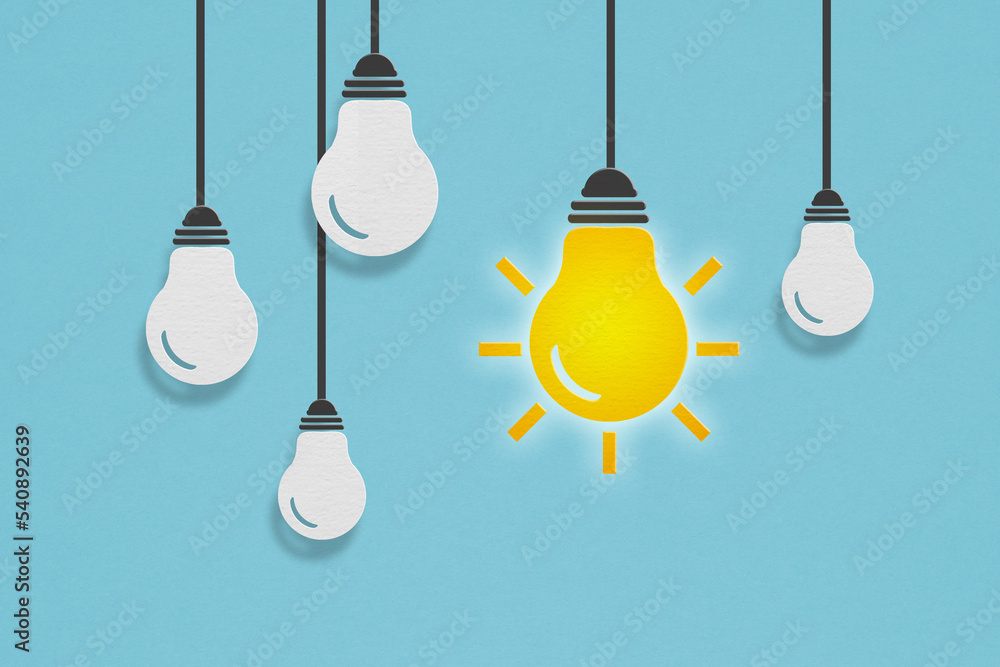idea concept, bright light and other white paper cut on grunge blue background idea concept, bright light and other white paper cut on grunge blue background