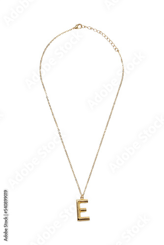 Detail shot of a metal golden necklace made out of a chain with a dangling pendant with a letter "E". The elegant necklace with a lobster clasp is isolated on the white background.