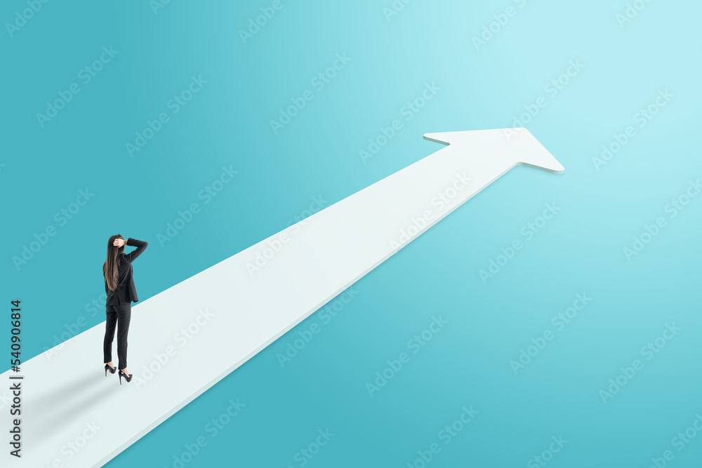 Side view of thoughtful young businesswoman on white arrow on blue background. Success, forward and up concept. Side view of thoughtful young businesswoman on white arrow on blue background. Success, forward and up concept.