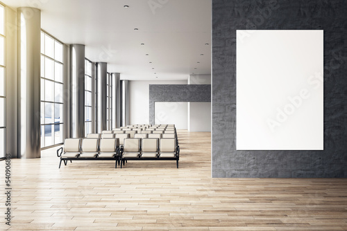 Obraz na płótnie Front view on blank white poster with space for your logo or text on dark grey stone wall in stylish empty airport waiting area hall with stylish seat rows and wooden floor