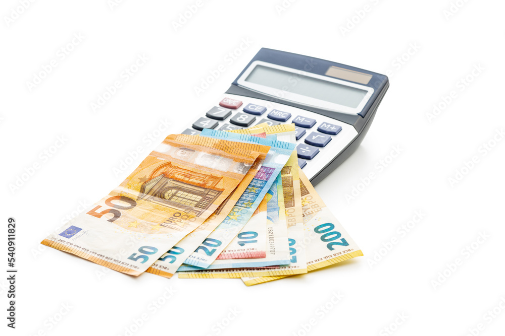 Calculator and euro paper banknotes money isolated on white background. Calculator and euro paper banknotes money isolated on white background.