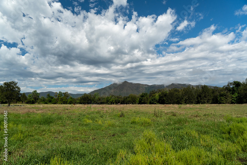Rural landscape with blue sky and clouds over the mountain. Widgee, Queensland, Australia 