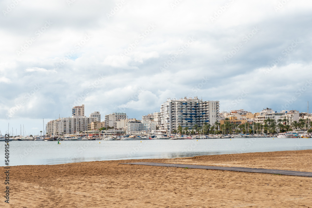 Naklejka premium Arenal beach in the coastal town of San Antonio Abad, Ibiza Island. Balearic