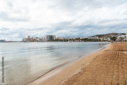 Beautiful Arenal beach in the coastal town of San Antonio Abad, Ibiza Island. Balearic © unai