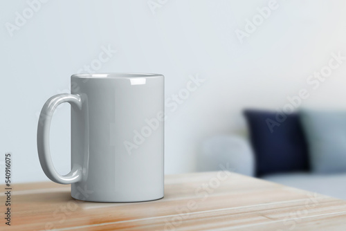 Mockup of close up blank white clay ceramic classic mug on table over bluured interior. Hot drink with steam concept. Isolated with copy space.