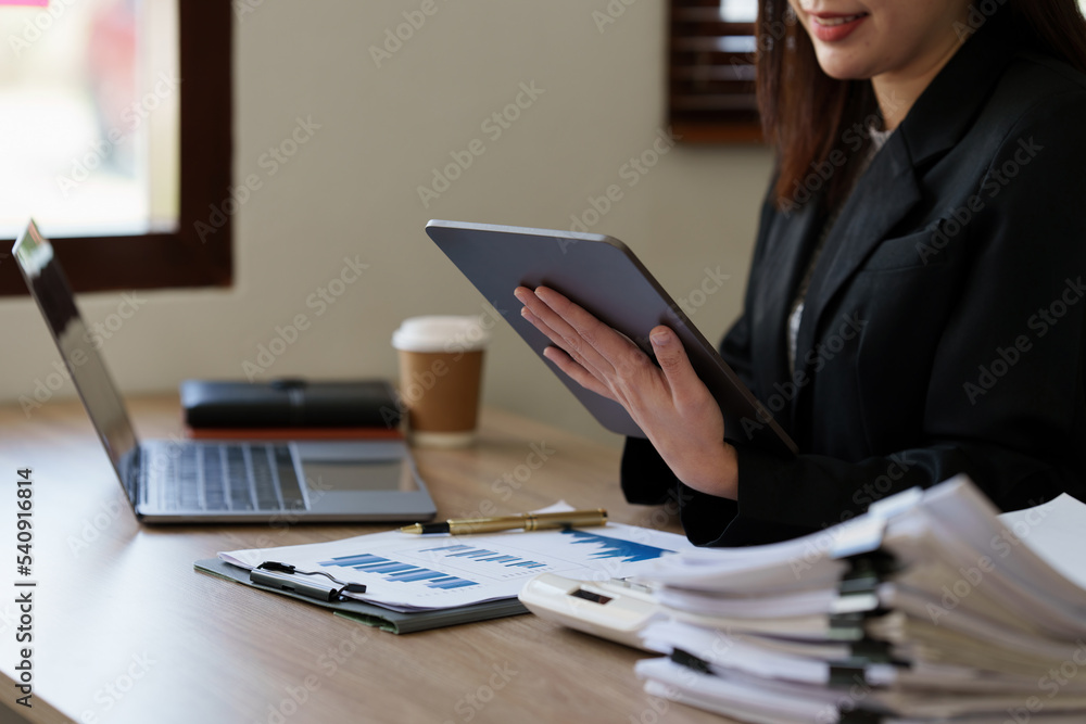 Beautiful asian businesswoman working in office. business finance concept Beautiful asian businesswoman working in office. business finance concept