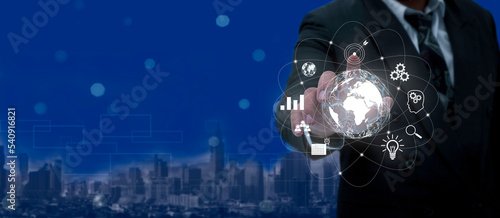 Businessman's hand holding virtual Global Internet connection metaverse with internet technology Digital global network connection,  digital marketing, investment, finance, big data link concept.