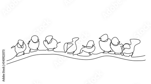 many birds are talking together on a tree branch, they are chatting
