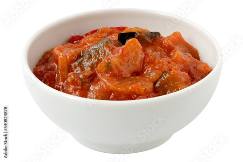 Ratatouille in white ceramic bowl isolated. photo