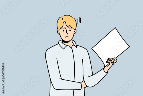Unhappy young man stand with white paper document. Dissatisfied businessman with paperwork in hands frustrated with results. Vector illustration. 