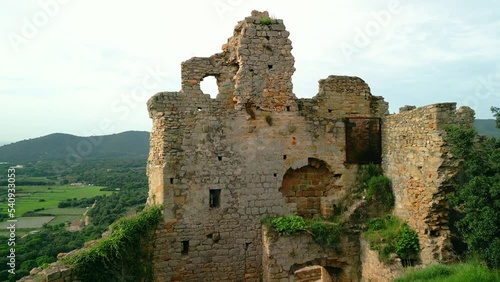 Ruined castle in Europe aerial footage cinematic medieval era  Close-up of a destroyed brick wall palafolls photo