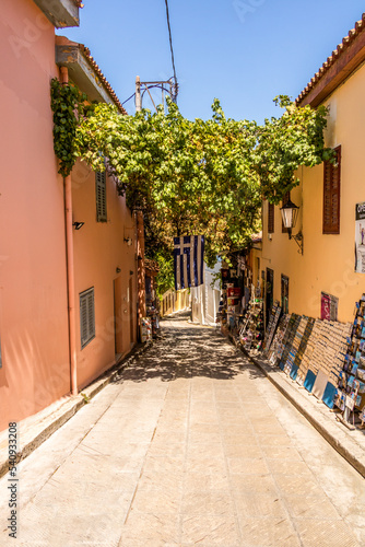 Fototapeta Naklejka Na Ścianę i Meble -  Street in Plaka district, Athens Greece