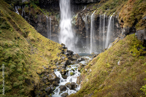 Colorful majestic waterfall in national park forest during autumn nature Photography.Landscape view national nature park Nikko Japan. Beautiful place