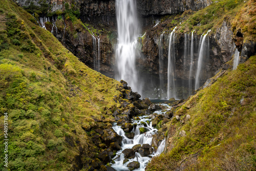 Colorful majestic waterfall in national park forest during autumn nature Photography.Landscape view national nature park Nikko Japan. Beautiful place