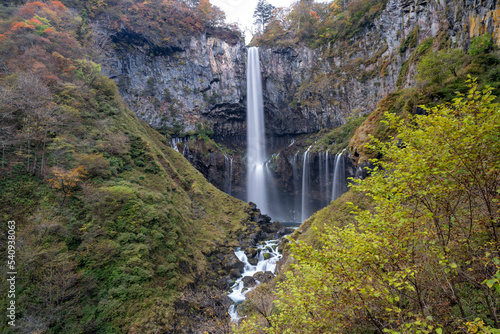 Colorful majestic waterfall in national park forest during autumn nature Photography.Landscape view national nature park Nikko Japan. Beautiful place