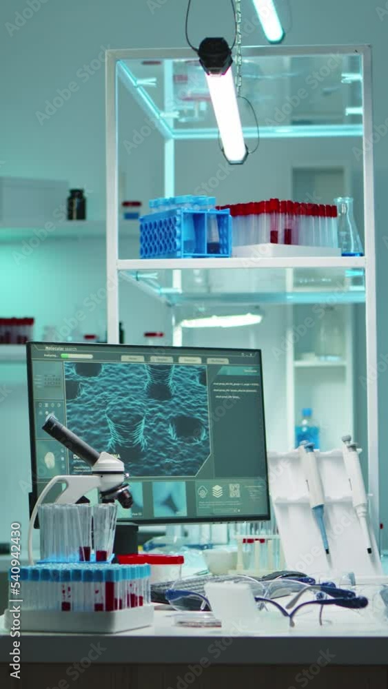 Vertical video: Interior of modern science laboratory with no people prepared for pharmaceutical innovation late at night using high tech, microbiology tools for scientific research. Vaccine against Vertical video: Interior of modern science laboratory with no people prepared for pharmaceutical innovation late at night using high tech, microbiology tools for scientific research. Vaccine against