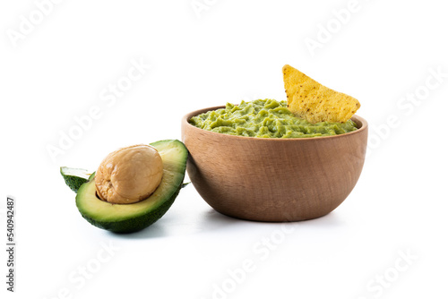 Mexican guacamole with nacho chip isolated on white background