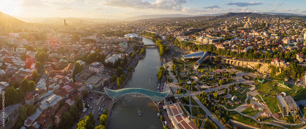 Panoramic aerial view of a summer sunset over downtown Tbilisi, Georgia