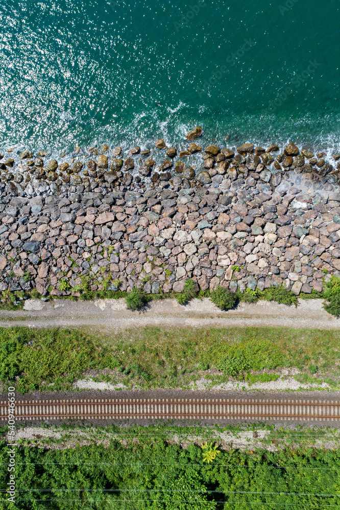 Railway along the sea coast, top view from a drone