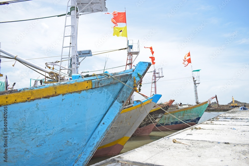Naklejka premium fishing boats in port