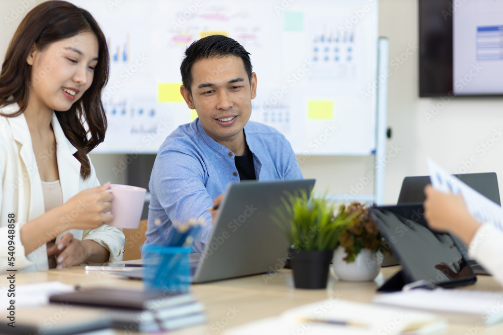Young people meeting to discuss successful business projects in the office. Human relations and working with colleagues in the organization happily. Young people meeting to discuss successful business projects in the office. Human relations and working with colleagues in the organization happily.