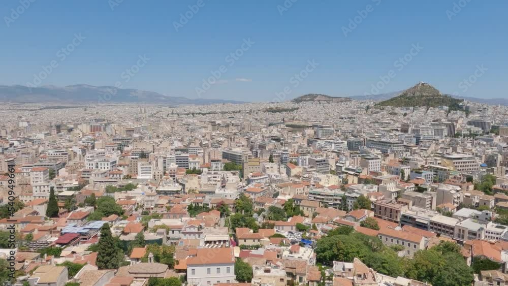 Aerial panning shot of the beautiful town of Athens, Greece Aerial panning shot of the beautiful town of Athens, Greece