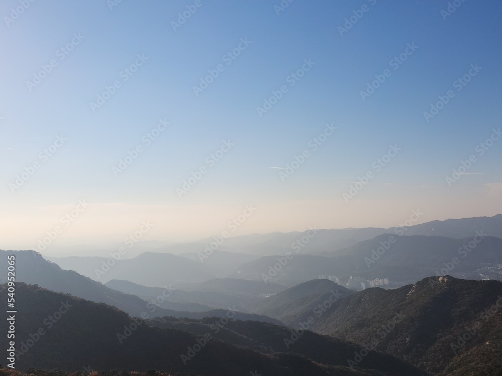 Fototapeta premium Bukhansan National Park. Mangwolsa Temple. autumn mountains. hiking Korean mountains. mountain landscapes in autumn. trekking. rise to the top of the mountain. fine dust in Korea