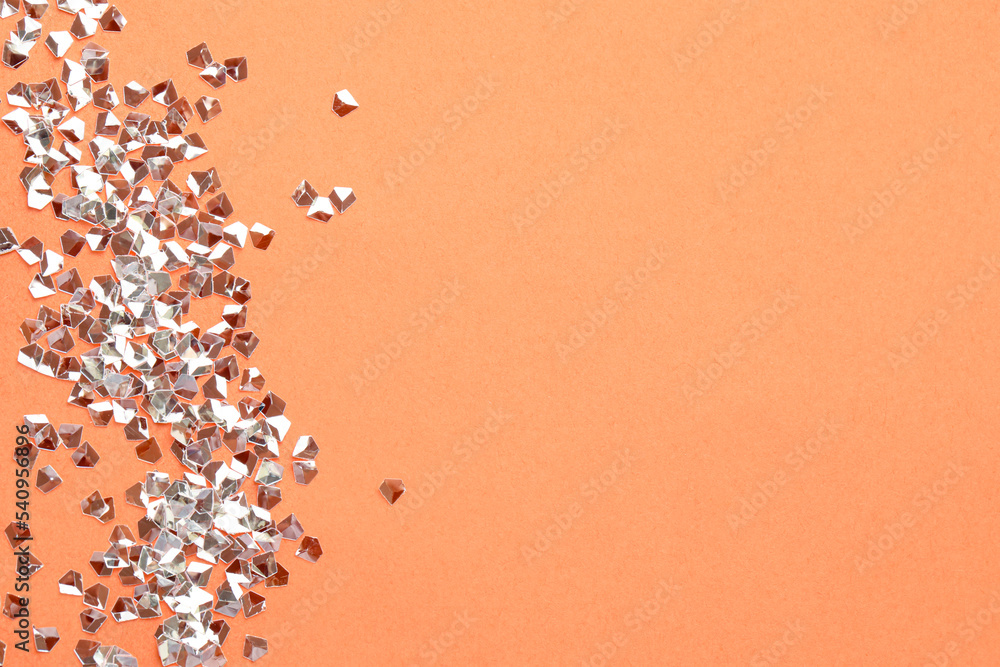 Pile of shiny glitter on pale pink background, flat lay. Space for text Pile of shiny glitter on pale pink background, flat lay. Space for text
