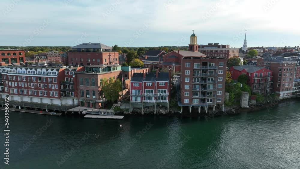 Historic Portsmouth New Hampshire and Piscataqua River. Market Square church, restored buildings in downtown colonial city in New England. Aerial above water. Historic Portsmouth New Hampshire and Piscataqua River. Market Square church, restored buildings in downtown colonial city in New England. Aerial above water.