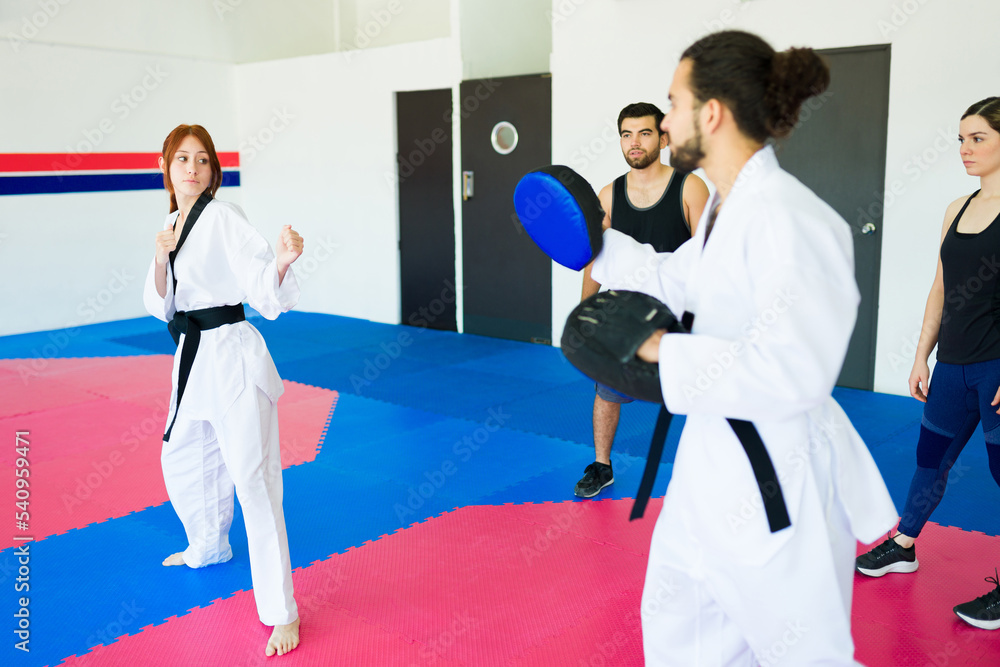 Female adult student ready for a karate practice