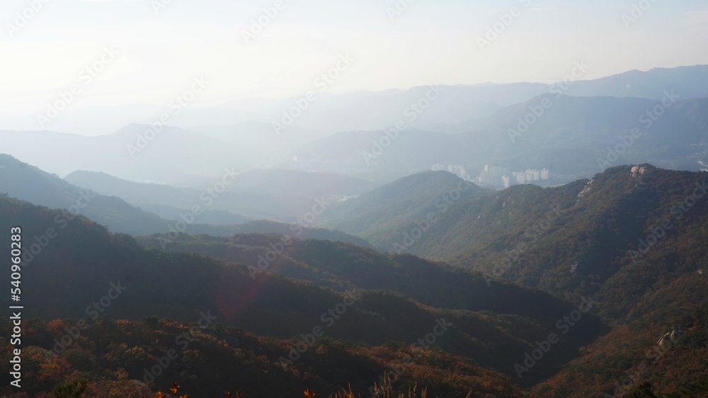 Bukhansan National Park. Mangwolsa Temple. autumn mountains. hiking Korean mountains. mountain landscapes in autumn. trekking. rise to the top of the mountain. fine dust in Korea