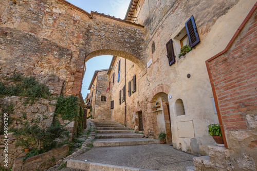 Cityscape. Medieval village in Tuscany - The Abbey of Santi Salvatore e Cirino  italian Abbadia a Isola   central Italy  near Monteriggioni  province of Siena  Italy