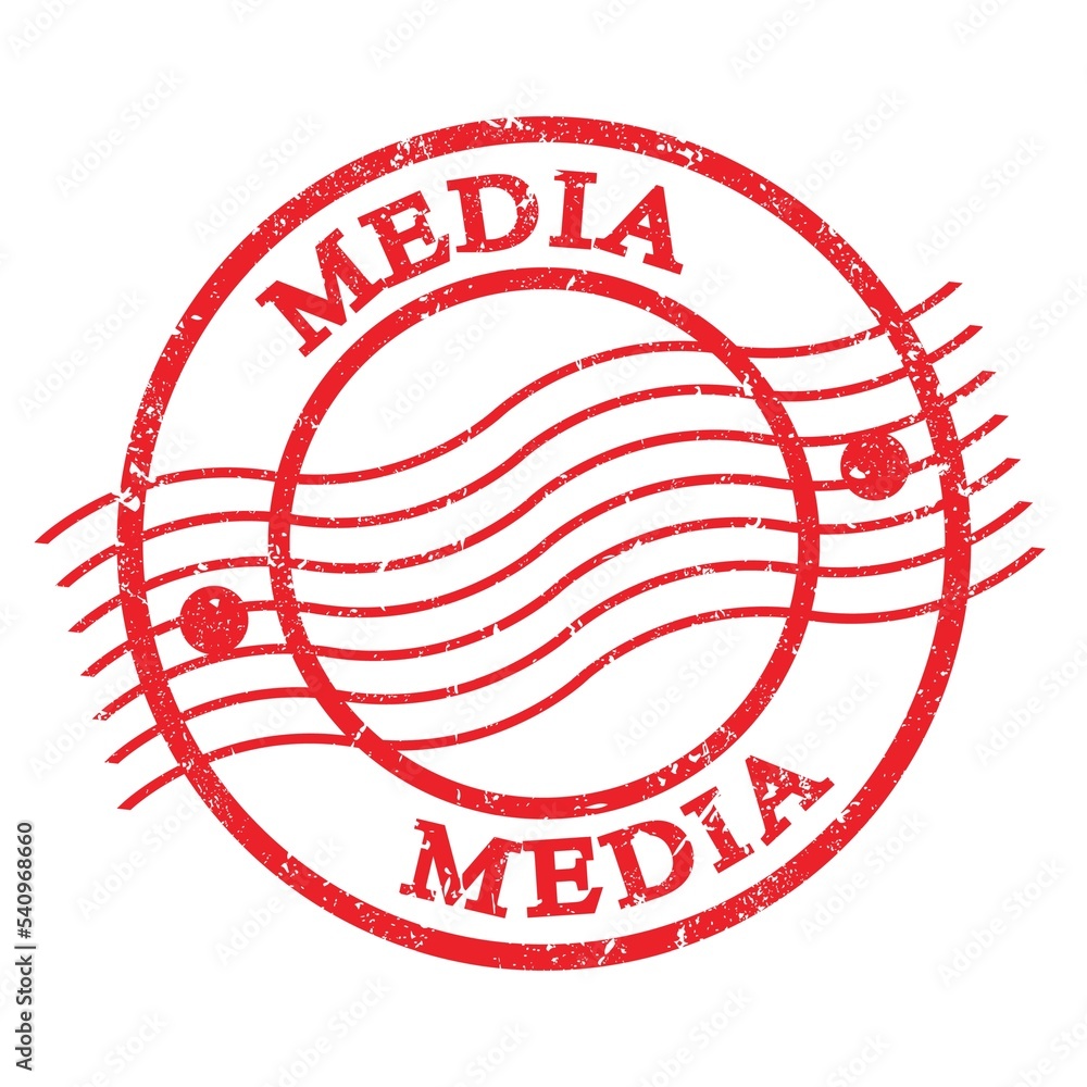 MEDIA, text written on red postal stamp. MEDIA, text written on red postal stamp.